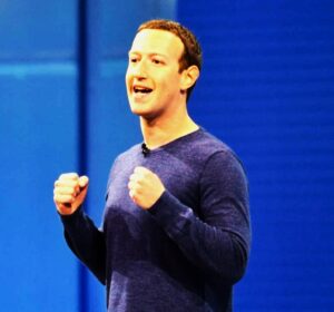 Mark Zuckerberg speaking on stage, photo from the waist up